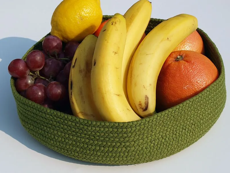 Koszyczek tekstylny na owoce w kolorze zielonym. Wykonany ręcznie z bawełny. Można prać w pralce.